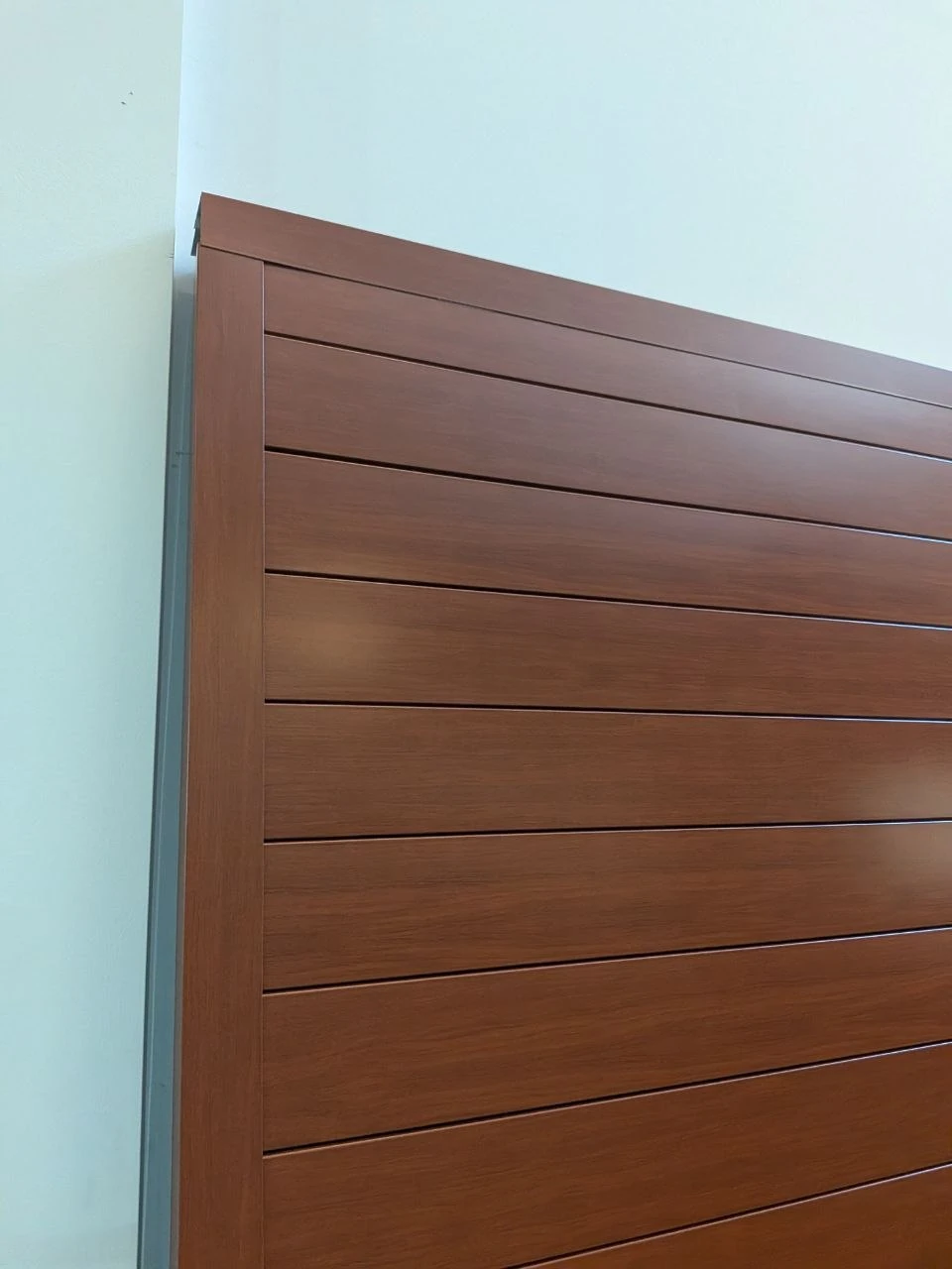 Wood-look V-Groove display showing its grain, joints and matching trim